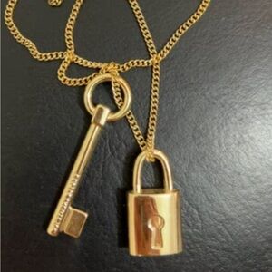 Victoria’s Secret key and lock necklace in gold tone